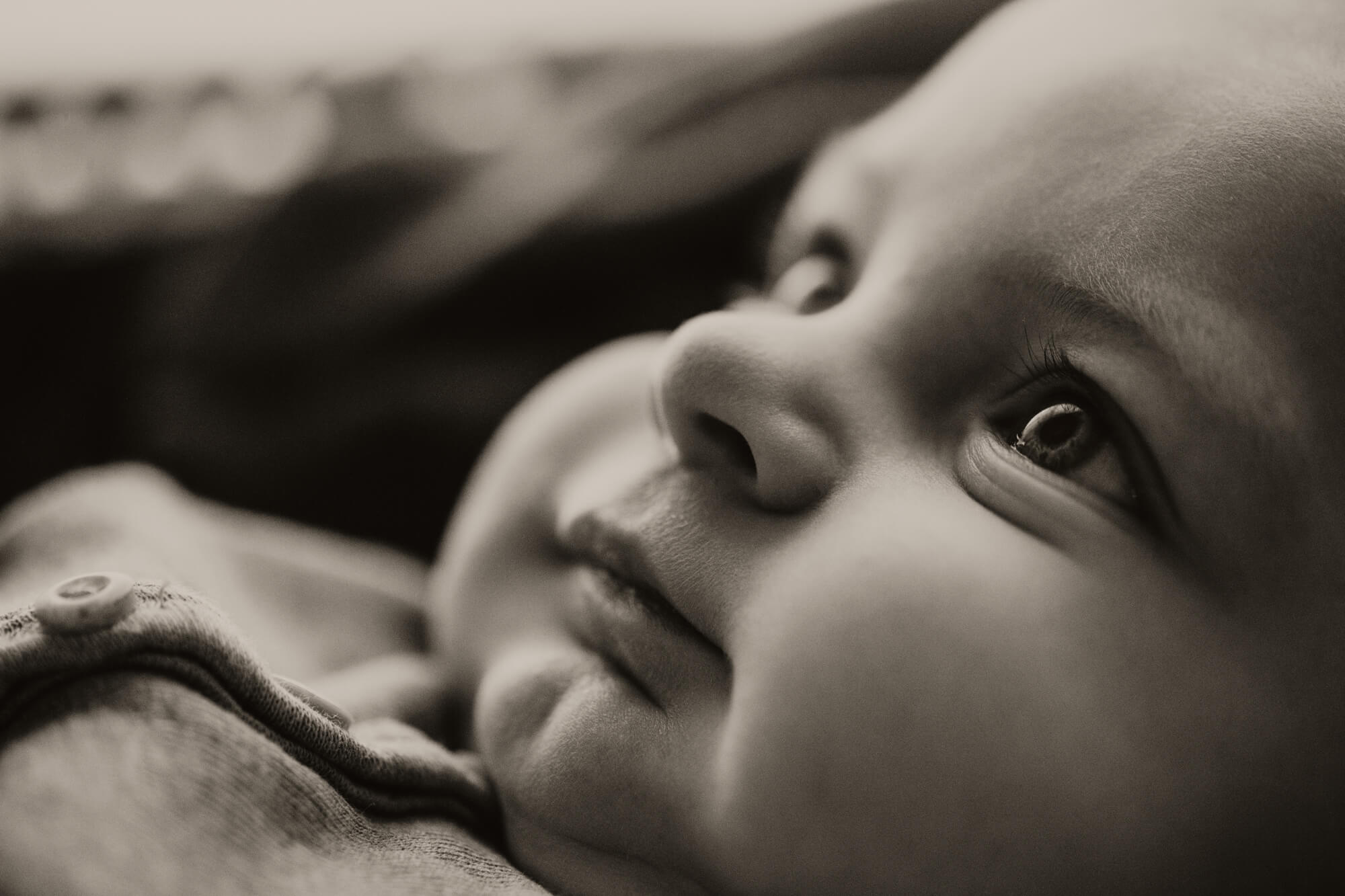 Black and white image of a baby boy.
