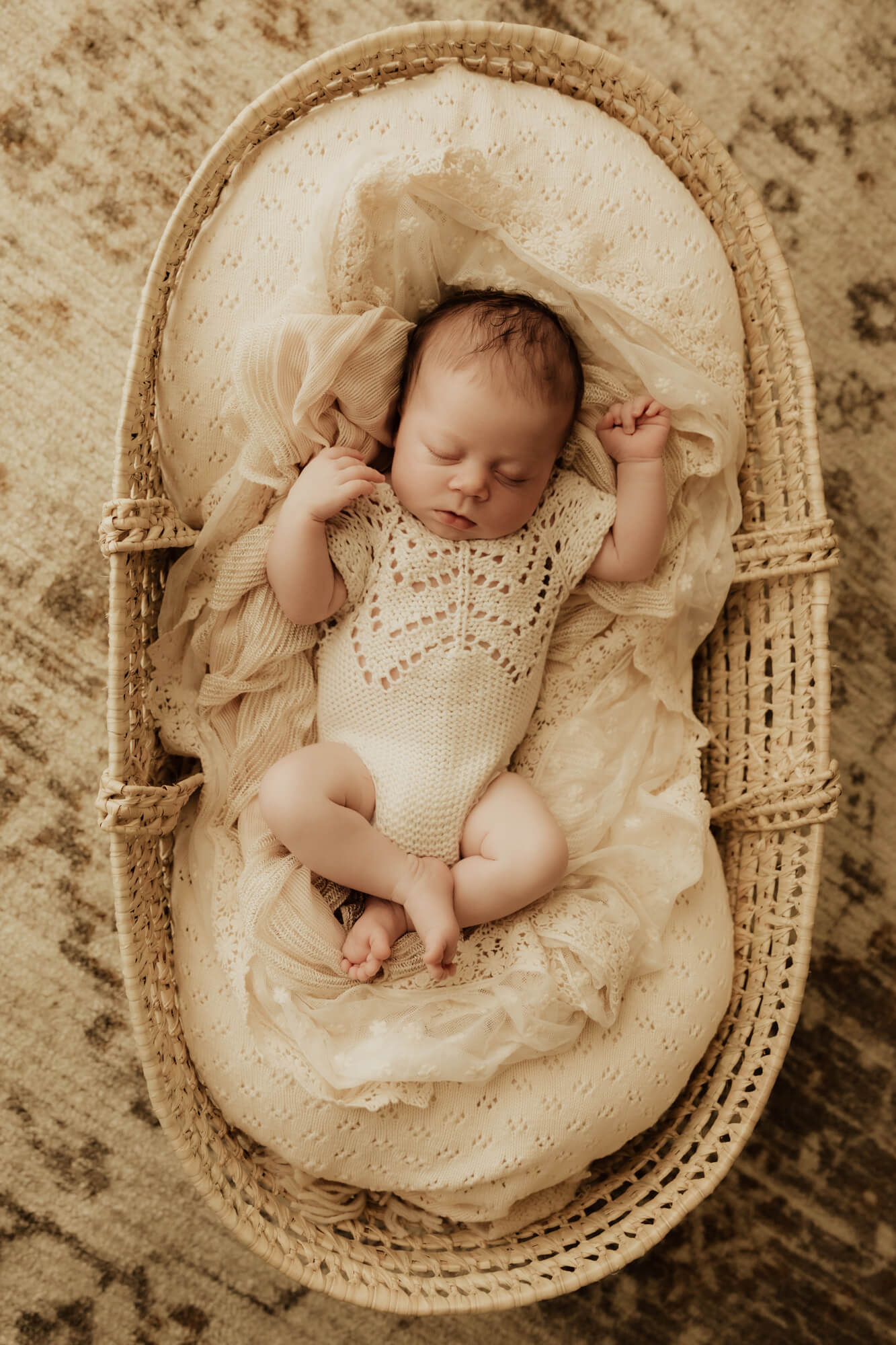 Baby girl sleeps in bassinet, Perinatal Center of Oklahoma.